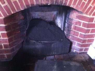 Fireplace full of soot